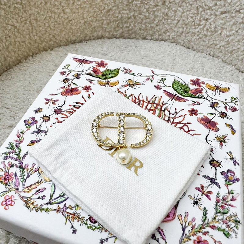 Dior Petit CD Brooch studded with Crystals and Dangling Pearl in Gold Tone HW