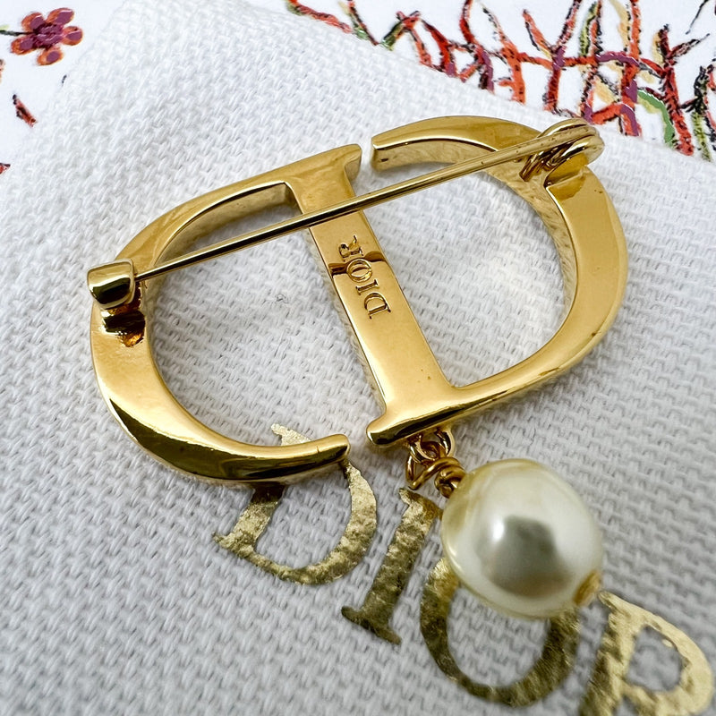 Dior Petit CD Brooch studded with Crystals and Dangling Pearl in Gold Tone HW