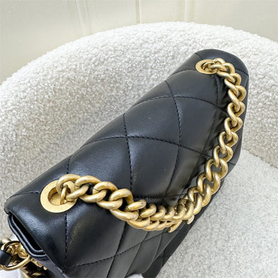 Chanel 21B Mini Flap Bag with Chain Top Handle in Black Lambskin and AGHW