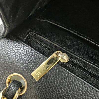 Chanel Classic Maxi Single Flap in Black Caviar and GHW