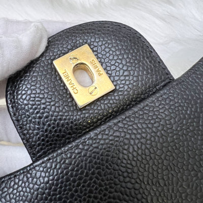 Chanel Classic Maxi Single Flap in Black Caviar and GHW