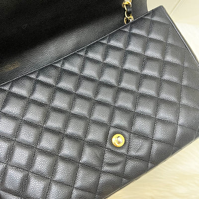 Chanel Classic Maxi Single Flap in Black Caviar and GHW