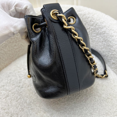 Chanel Mini Drawstring Bucket Bag in Glossy Distressed Black Calfskin and AGHW