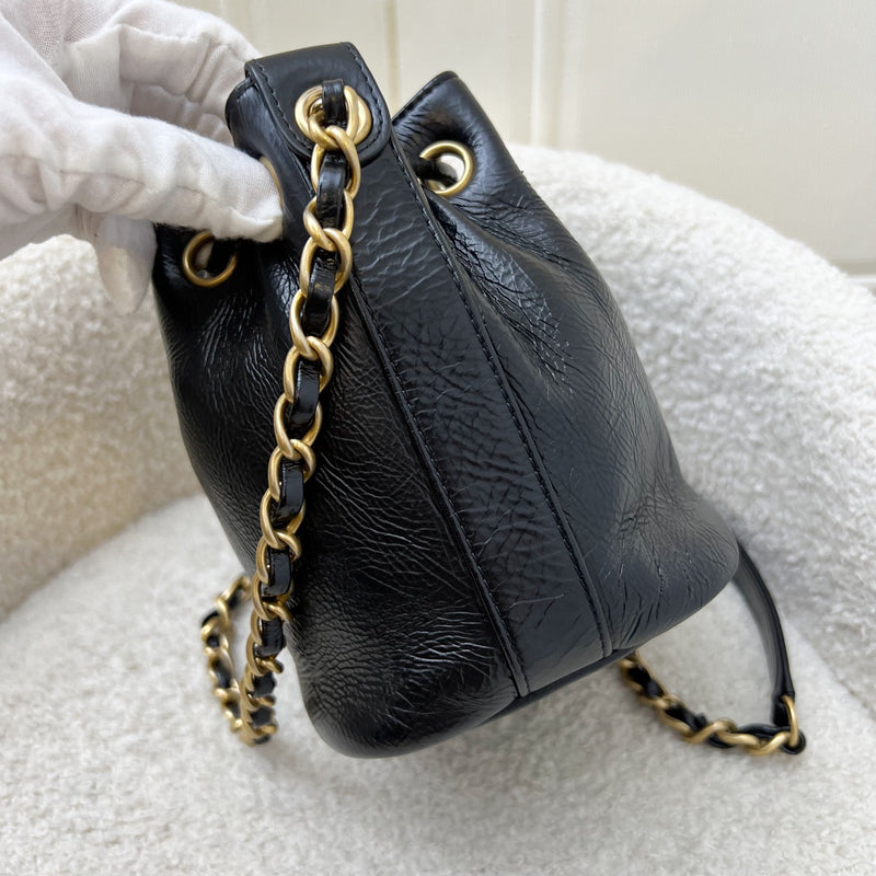 Chanel Mini Drawstring Bucket Bag in Glossy Distressed Black Calfskin and AGHW