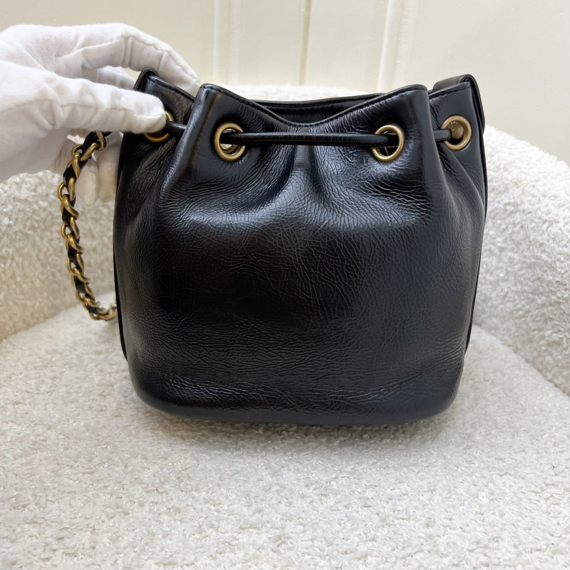 Chanel Mini Drawstring Bucket Bag in Glossy Distressed Black Calfskin and AGHW