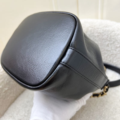 Chanel Mini Drawstring Bucket Bag in Glossy Distressed Black Calfskin and AGHW