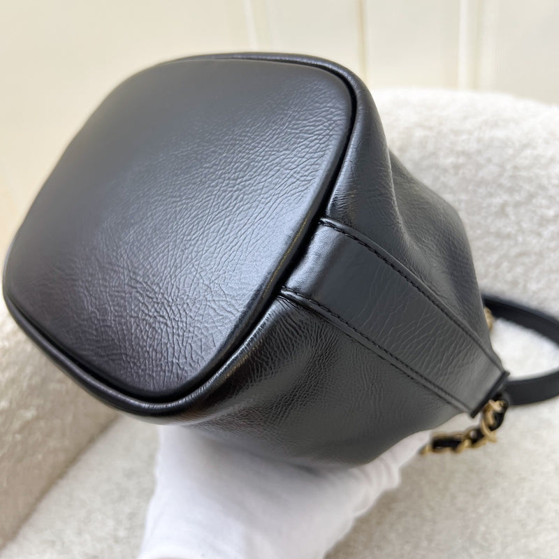 Chanel Mini Drawstring Bucket Bag in Glossy Distressed Black Calfskin and AGHW