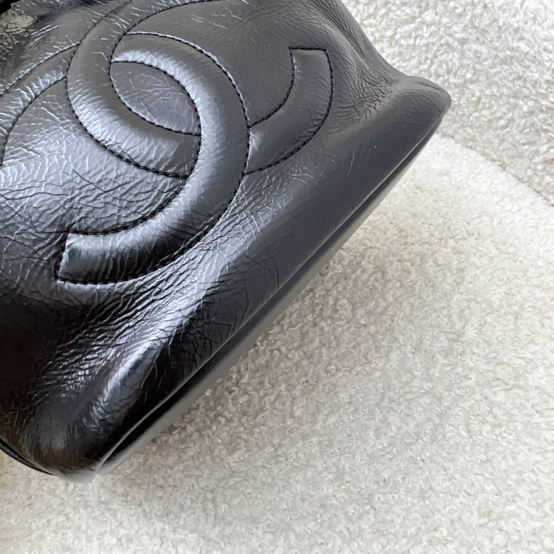 Chanel Mini Drawstring Bucket Bag in Glossy Distressed Black Calfskin and AGHW
