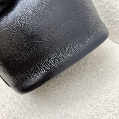 Chanel Mini Drawstring Bucket Bag in Glossy Distressed Black Calfskin and AGHW