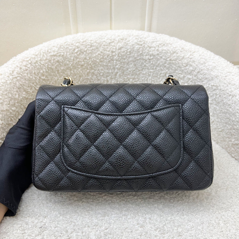 Chanel Classic Mini Rectangle Flap in Black Caviar and GHW