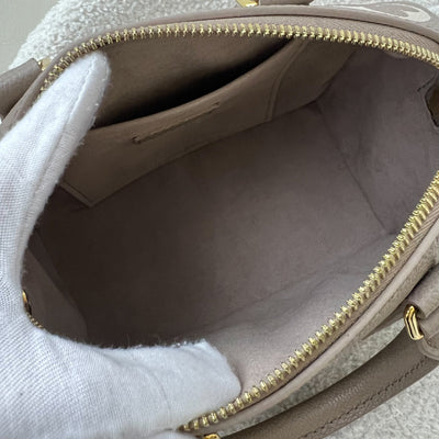 LV Speedy Bandouliere 20 in Tourterelle / Creme Giant Monogram Empreinte Leather and GHW