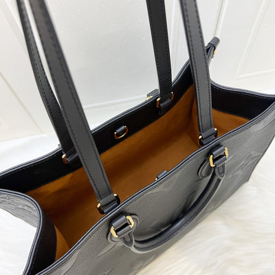 LV Onthego MM Tote in Black Giant Monogram Empreinte Leather and GHW