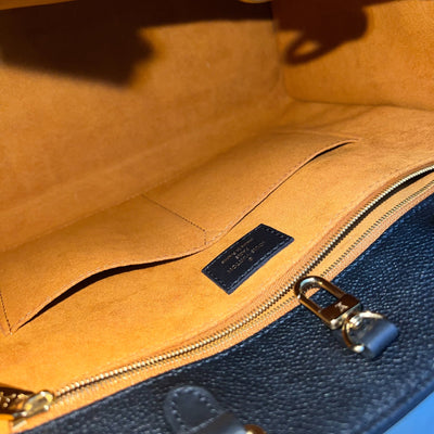 LV Onthego MM Tote in Black Giant Monogram Empreinte Leather and GHW