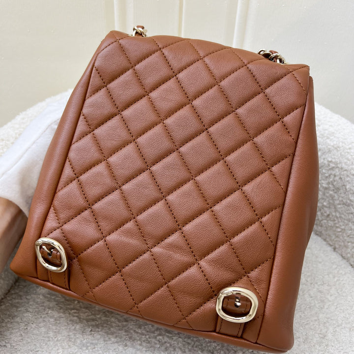 Chanel Medium Triple Backpack in 23A Cognac Brown Calfskin and