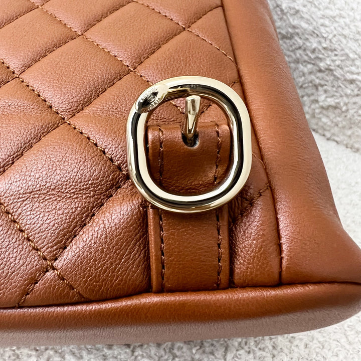 Chanel Medium Triple Backpack in 23A Cognac Brown Calfskin and