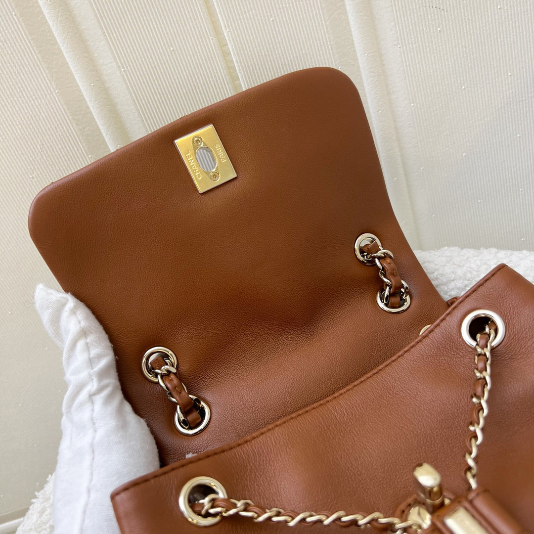 Chanel Medium Triple Backpack in 23A Cognac Brown Calfskin and