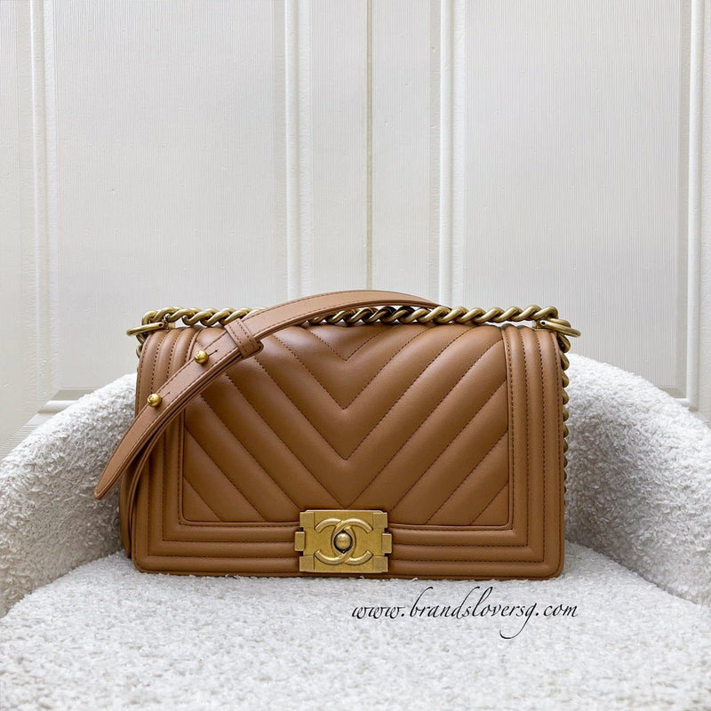 Chanel Medium 25cm Boy Flap in Chevron Quilted Caramel Lambskin and AGHW (Model: A67086)