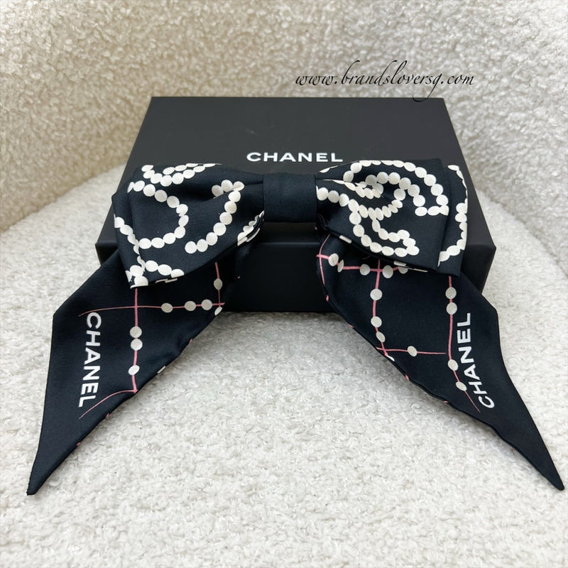 Chanel 23K Printed Pearl Motifs Bow Hair Clip in Black and Off White Fabric with Silver French Barrette