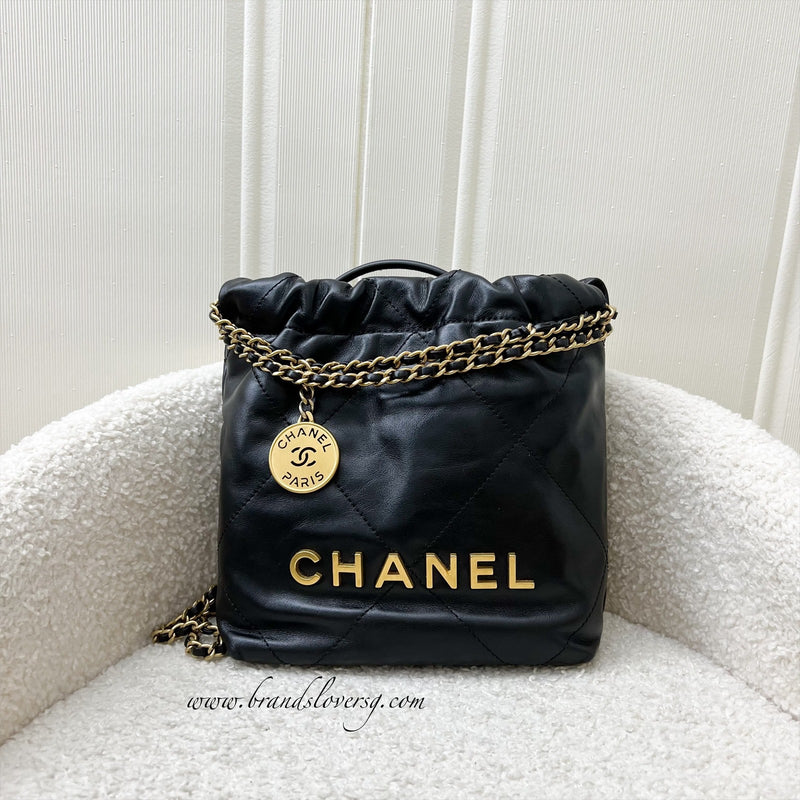 Chanel 22 Mini Hobo Handbag in Black Shiny Calfskin and AGHW