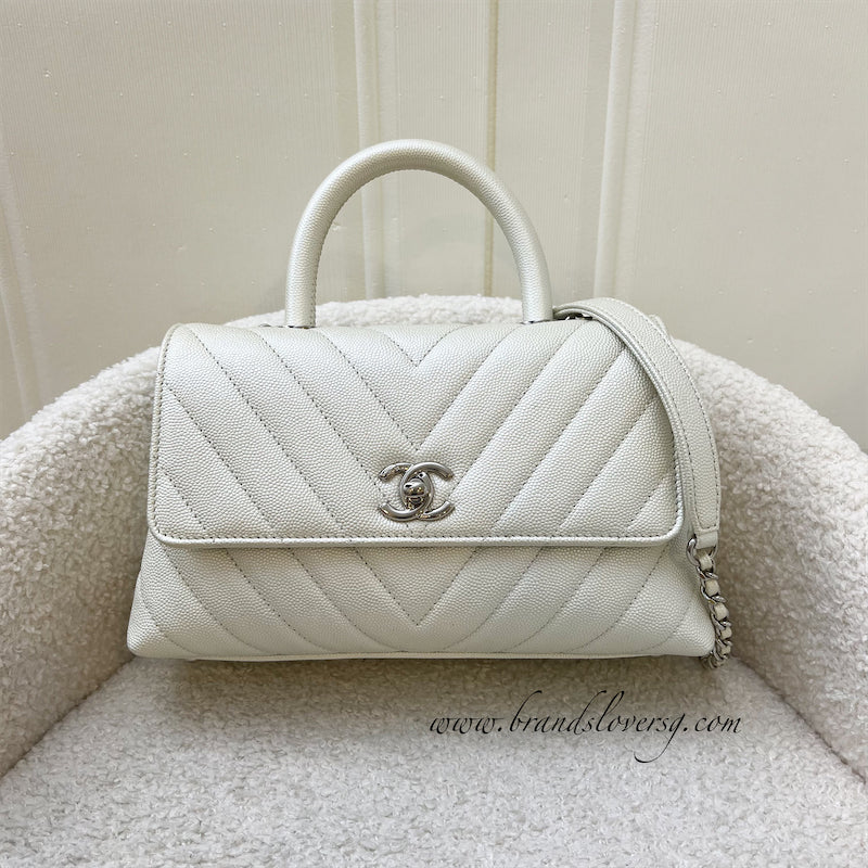 Chanel Small 24cm Coco Handle in Chevron Quilted Pearly White Caviar and SHW