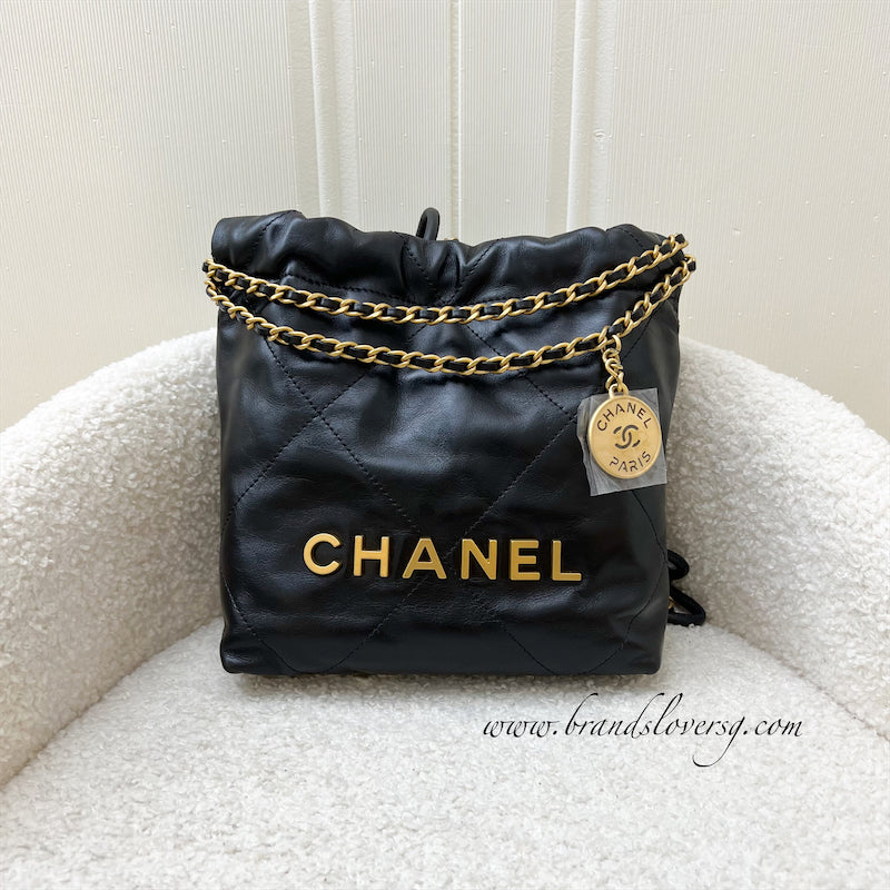 Chanel 22 Mini Hobo Handbag in Black Shiny Calfskin and AGHW