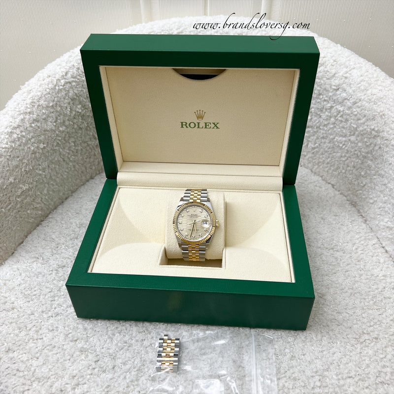 Rolex Datejust 36, with Gold Dial, 10 Diamond Markers, 18K Golden Fluted Bezel with Gold and Oystersteel Jubilee Bracelet (126233)