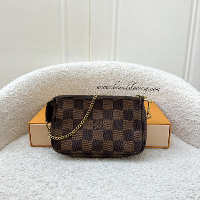 LV Mini Pochette Accessoires in Damier Ebene Canvas GHW