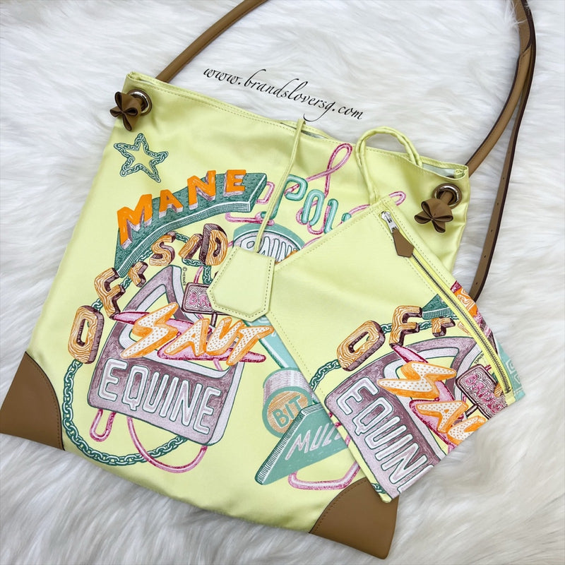 Hermes Silkycity 33 Bag in "Fantaisie Chevaloscope Neon" Printed Silk and Swift Calfskin in Jaune Pâle / Biscuit