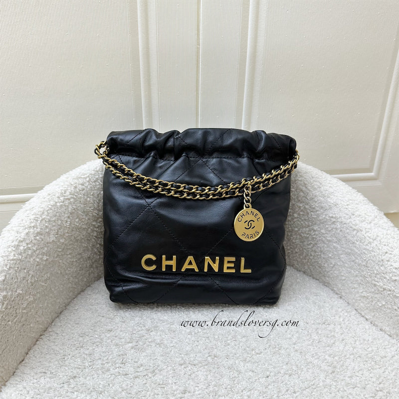 Chanel 22 Mini Hobo Handbag in Black Shiny Calfskin and AGHW